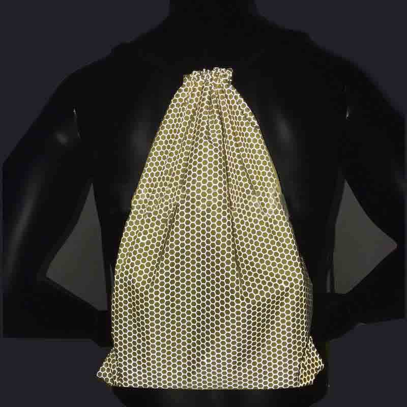 Reflective drawstring backpack showing night visibility effect for OEM bag and outdoor accessory design Reflective drawstring backpack showing night visibility effect for OEM bag and outdoor accessory design